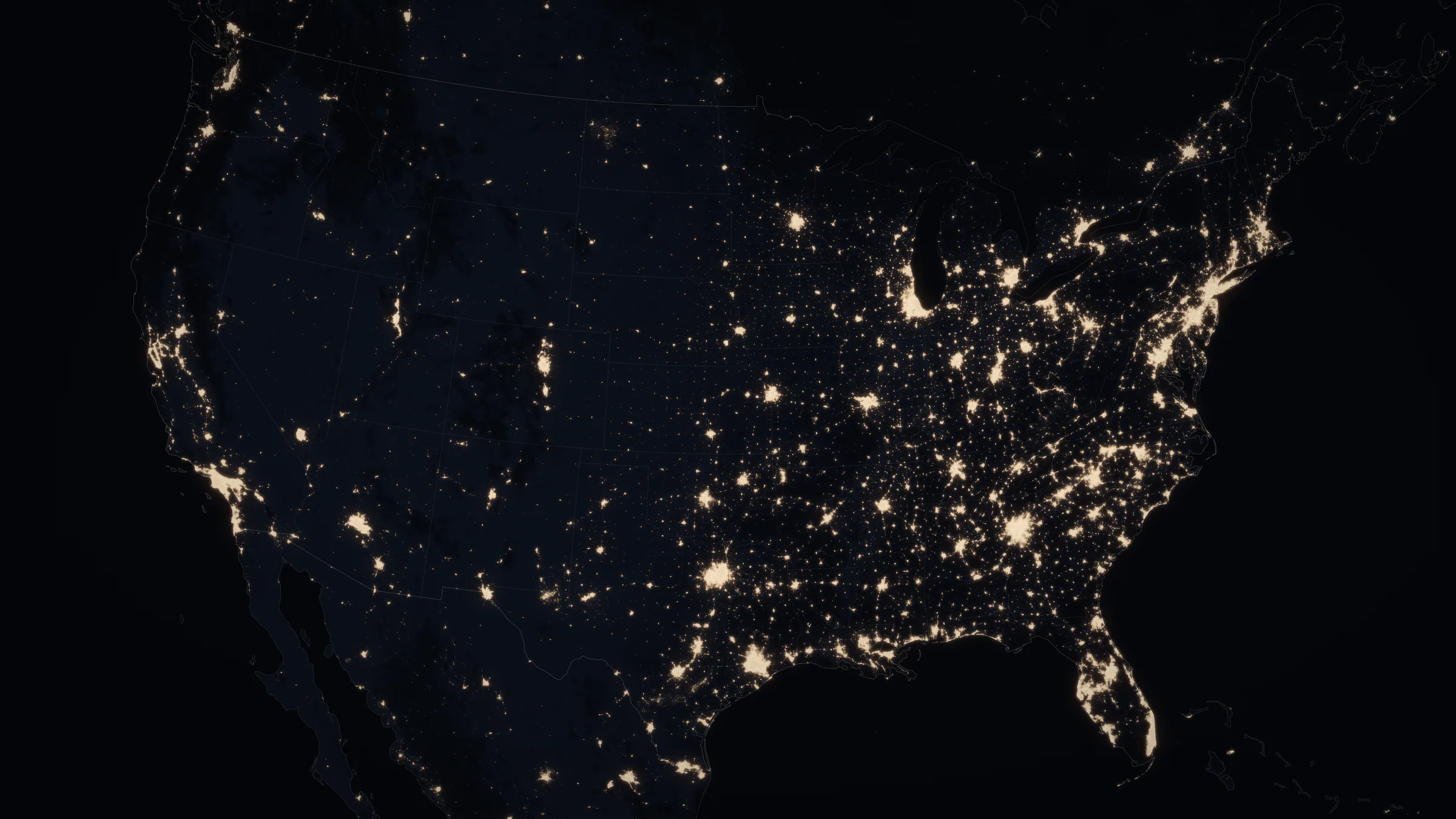 The United States at night from orbit, with Las Vegas, Los Angeles, Chicago, Milwaukee and New York marked