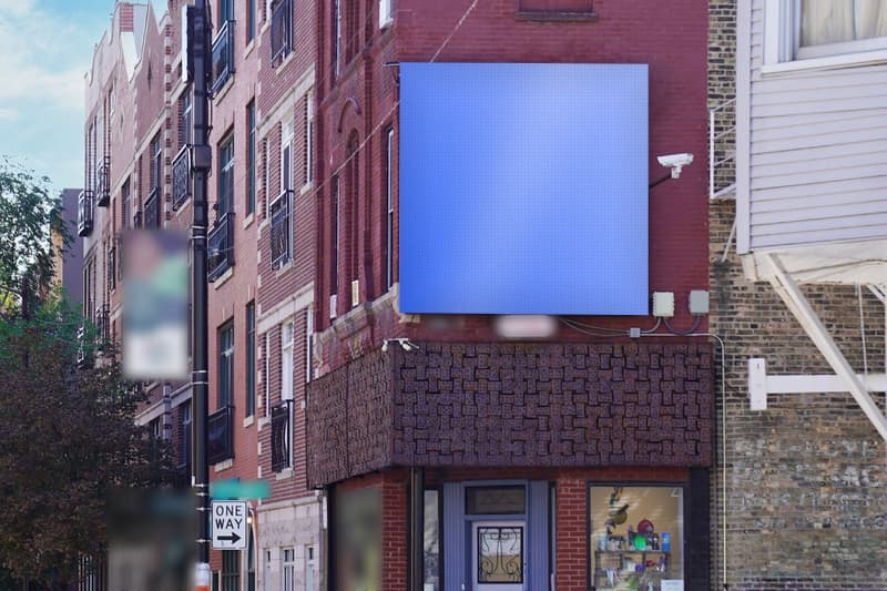 Compact digital screen at Belmont Ave at Hoyne Ave · Roscoe Village, photographed by day; the advertiser's content is replaced with a preview of your brand