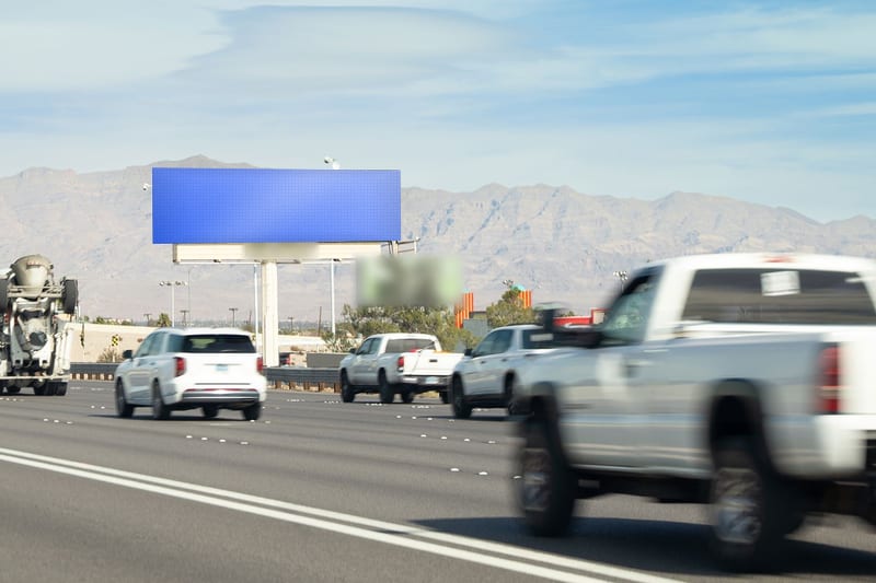 Digital bulletin at US-95 near Vegas Dr · Northwest, photographed by day; the advertiser's content is replaced with a preview of your brand