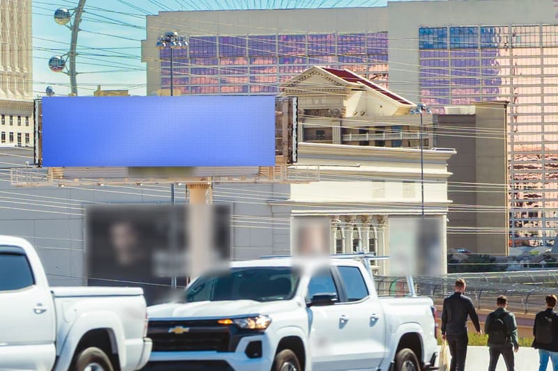 Digital bulletin at Flamingo Rd near I-15 · behind the Strip resorts, photographed by day; the advertiser's content is replaced with a preview of your brand