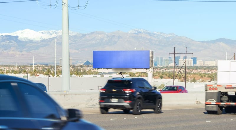 Digital bulletin at US-95 north of the 215 interchange · Henderson, photographed by day; the advertiser's content is replaced with a preview of your brand