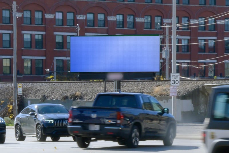 Digital bulletin at 1st St at Pittsburgh Ave · Walker's Point, photographed by day; the advertiser's content is replaced with a preview of your brand